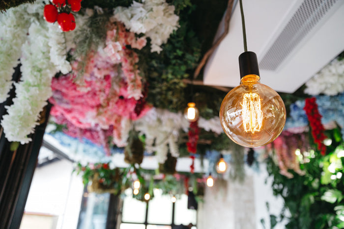 Why should we light lamps at home/workspace
