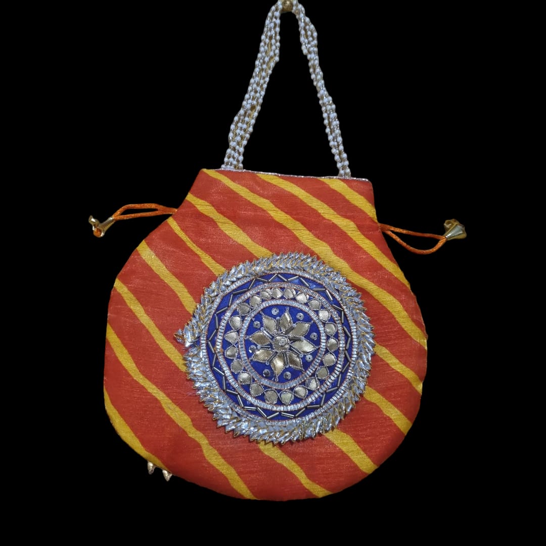 1 Pc Orange Potli with Purple motif Pouch
