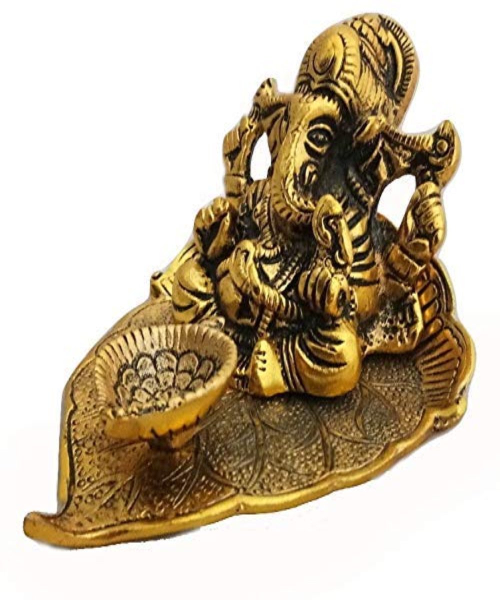 Lord Ganesh Idol Statue On Lotus Flower Diya