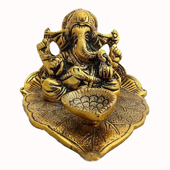 Lord Ganesh Idol Statue On Lotus Flower Diya