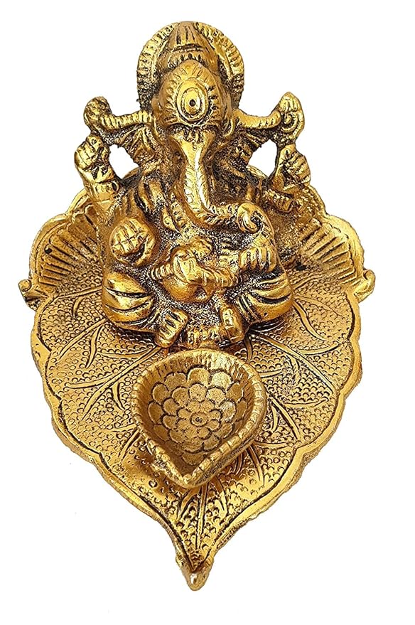 Lord Ganesh Idol Statue On Lotus Flower Diya