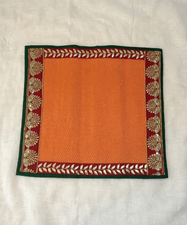 Orange Nylon Handmade Chatai/Mat with Green, Red & Golden sequins work on the Trim/Lace 24x24 (in inch)