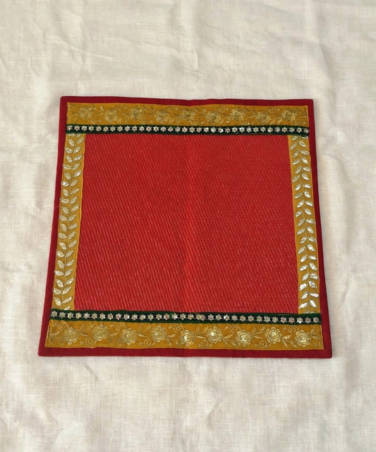 Red Nylon Handmade Chatai/Mat with Red,Yellow,Green & Golden sequins work on the Trim/Lace 24x24 (in inch)