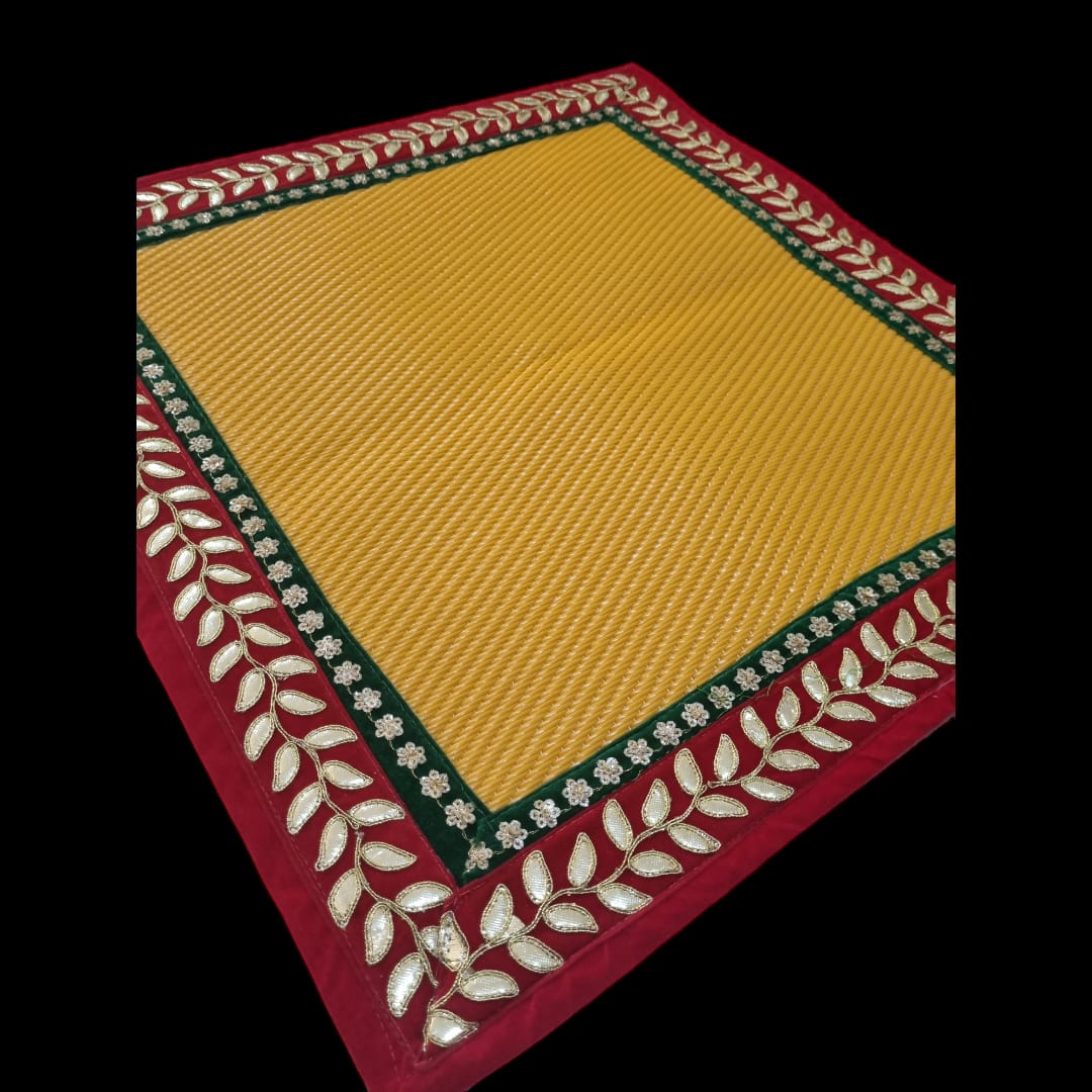 Yellow Nylon Handmade Chatai/Mat with Red, Green & Golden sequins work on the Trim/Lace 24x24 (in inch)