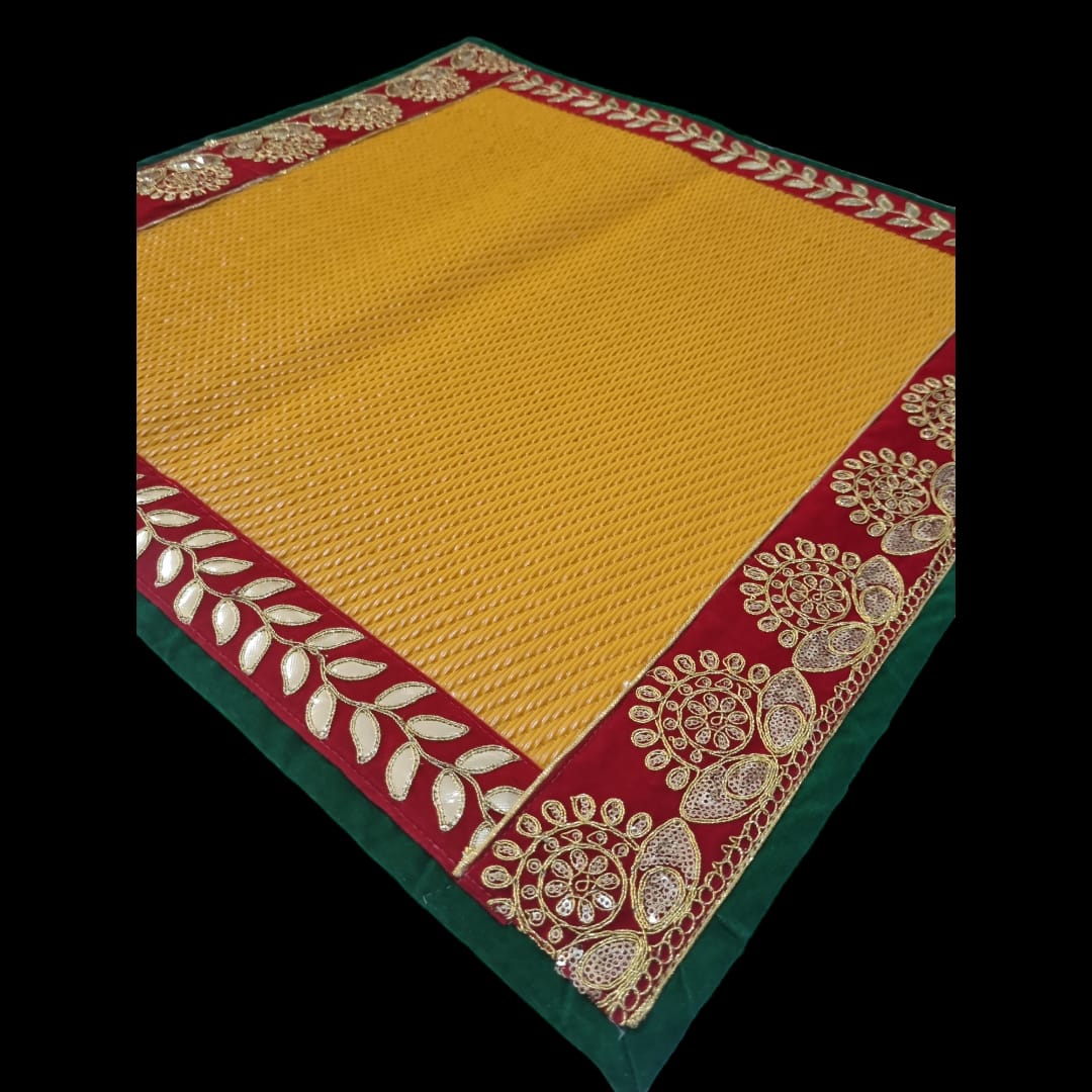 Yellow Nylon Handmade Chatai/Mat with Green, Red & Golden sequins work on the Trim/Lace 24x24 (in inch)