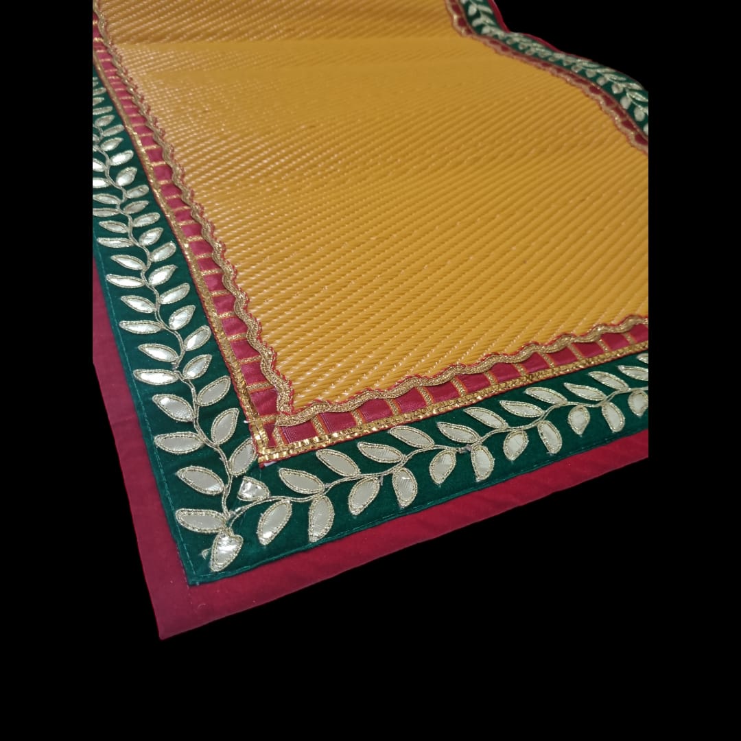 Yellow Nylon Handmade Chatai/Mat with Red, Green & Golden sequins work on the Trim/Lace 48x24 (in inch)