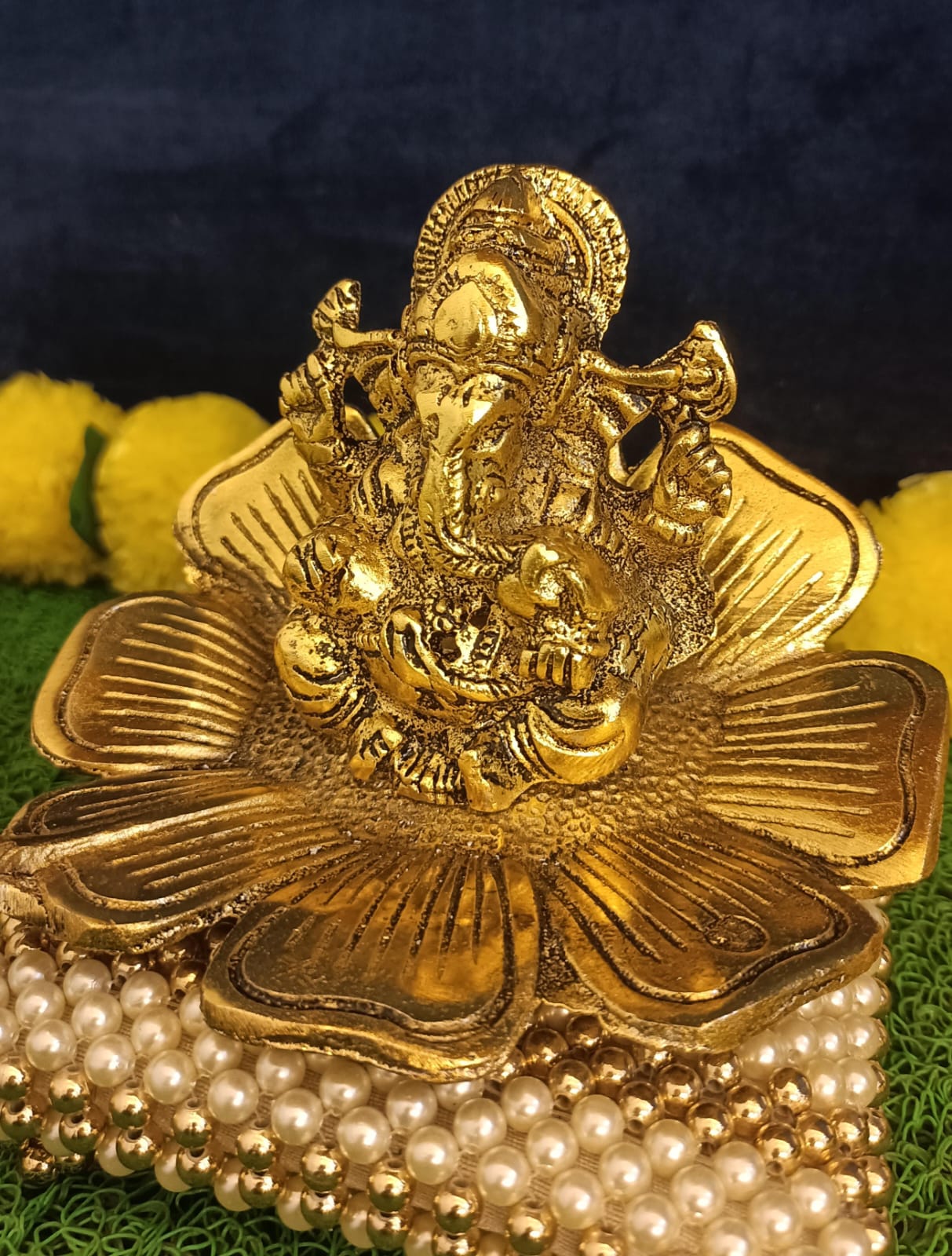 Ganesh Idol on Leaf Lord Ganesha with Diya Metal Hand Craved for Home Decor