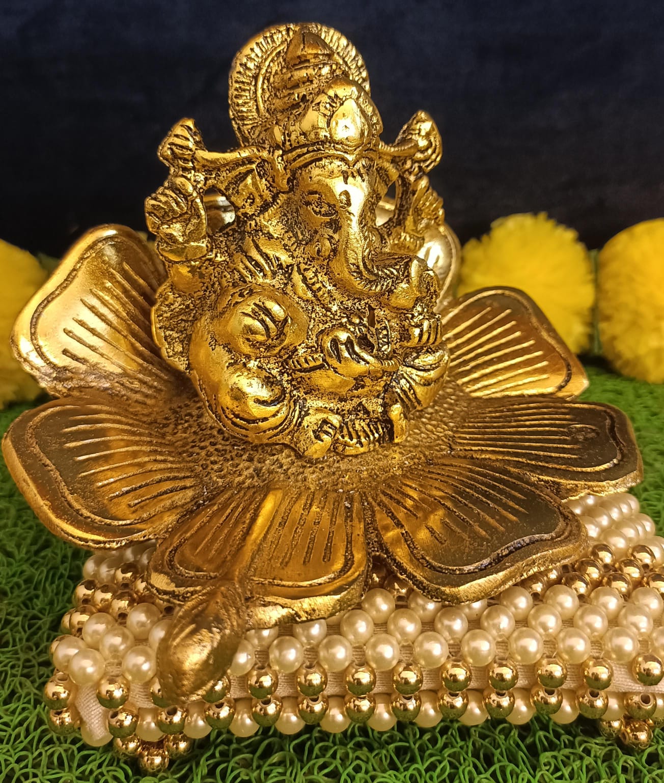 Ganesh Idol on Leaf Lord Ganesha with Diya Metal Hand Craved for Home Decor