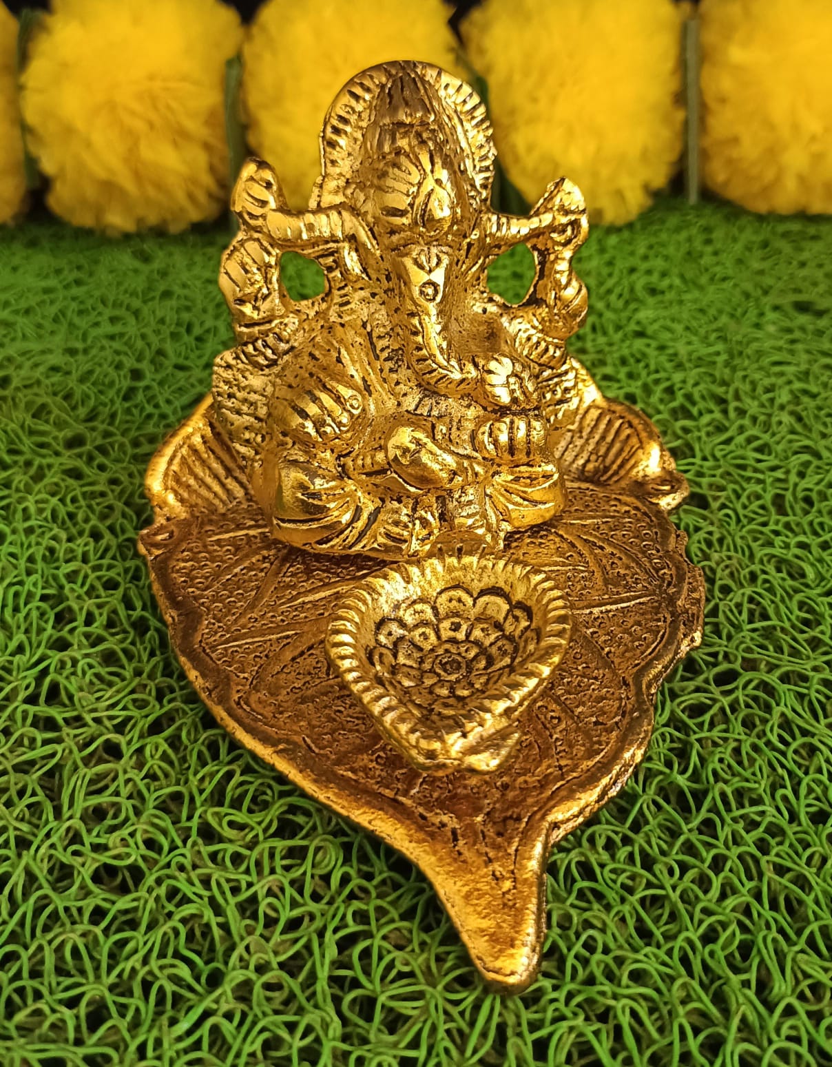 Lord Ganesh Idol Statue On Lotus Flower Diya