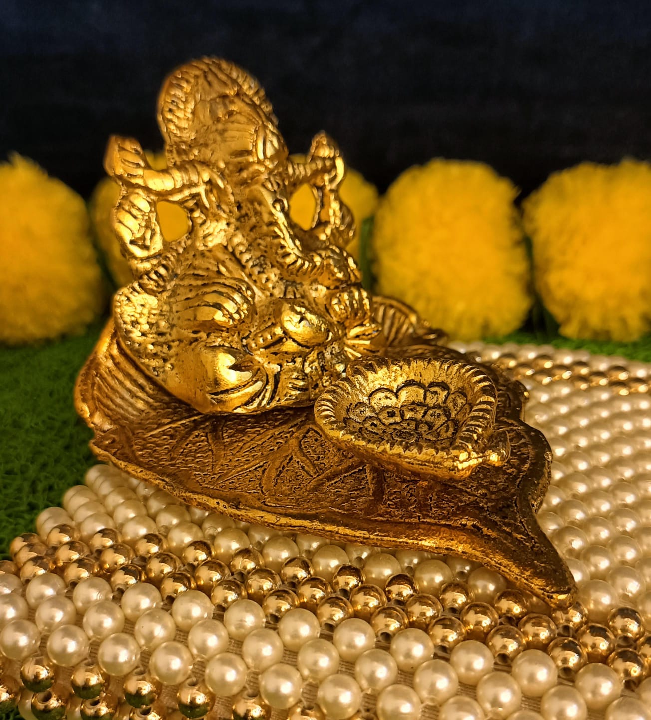 Lord Ganesh Idol Statue On Lotus Flower Diya