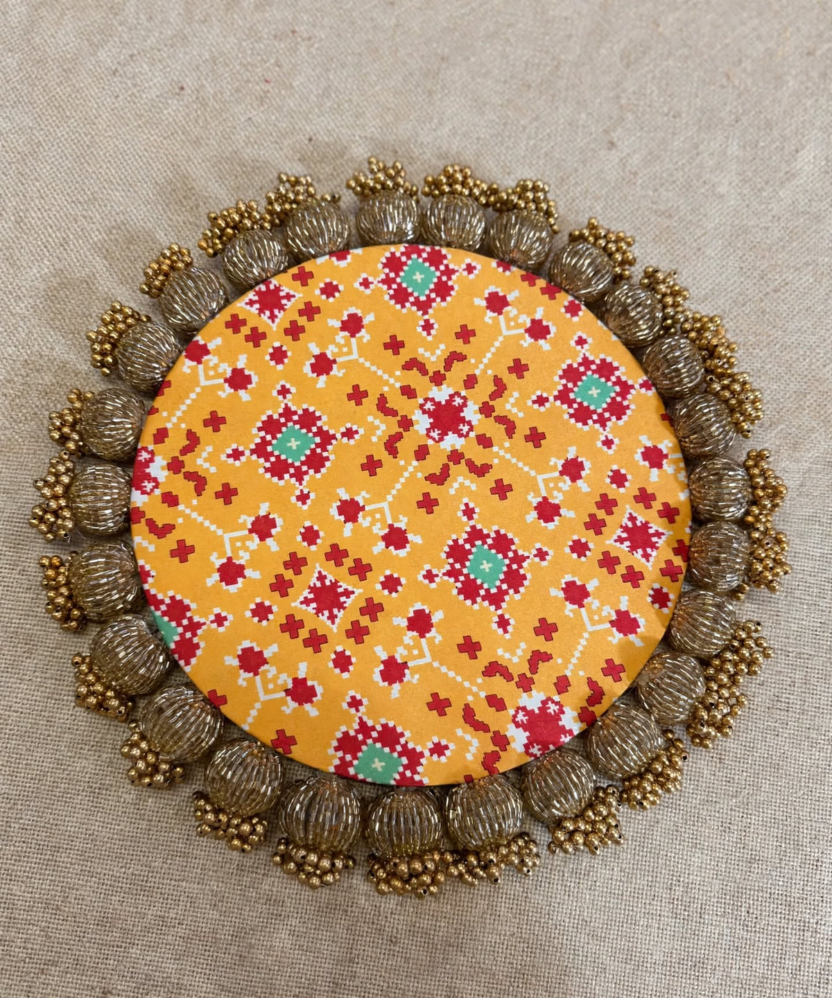 Decorative Rangoli Mat - Patola Print Lotus Pichwai and Gota Patti Work with Golden Moti Ball Tassel Border