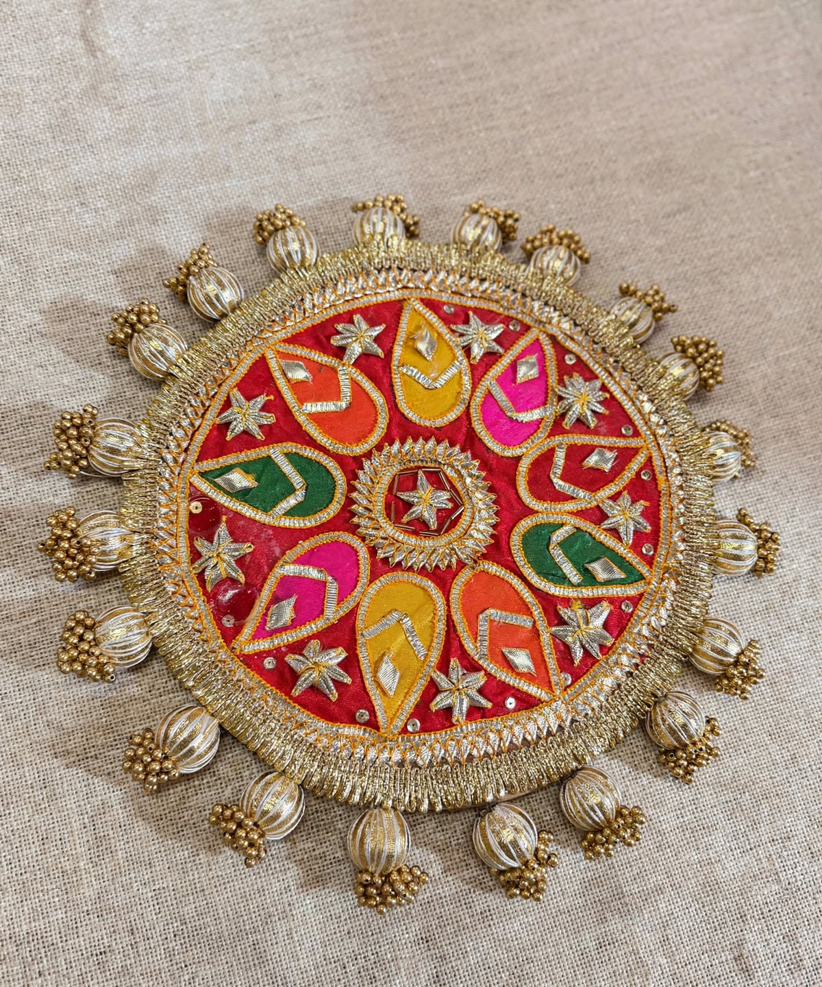 Decorative Rangoli Mat - Patola Print Lotus Pichwai and Gota Patti Work with Golden Moti Ball Tassel Border