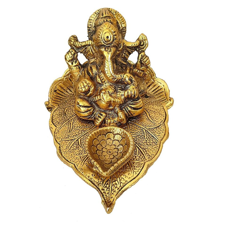 Lord Ganesh Idol Statue On Lotus Flower Diya